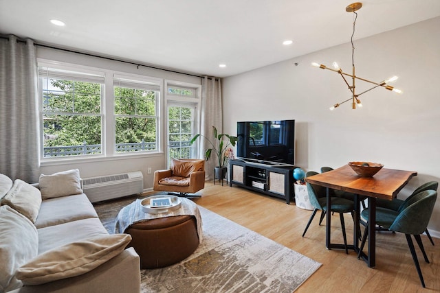 30 Freedom Way Unit 302, Jersey City, NJ 07305 - living area featuring a chandelier, light wood finished floors, and recessed lighting