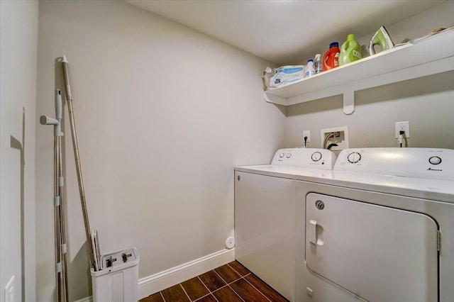 2765 Kennedy Blvd Unit 1, Jersey City, NJ 07306 - washroom featuring separate washer and dryer and dark wood finished floors