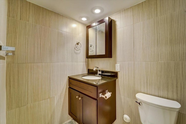 2765 Kennedy Blvd Unit 1, Jersey City, NJ 07306 - half bathroom featuring tile walls and vanity