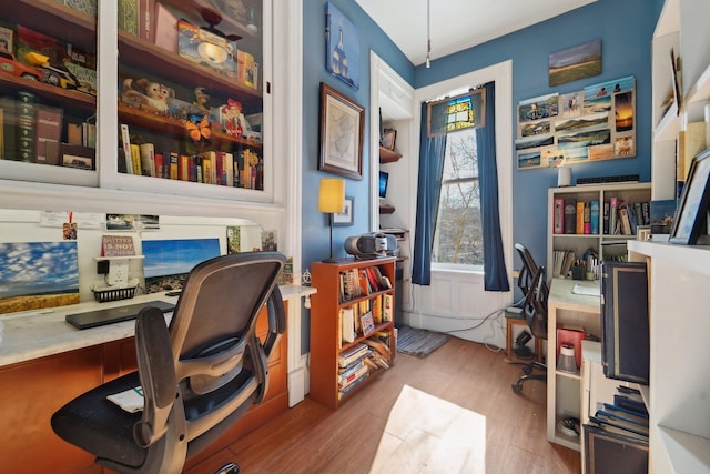 home office with light wood-type flooring