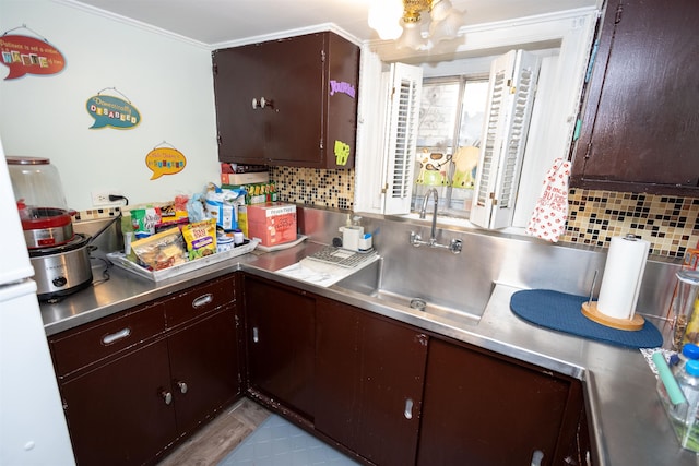 9005 Durham Ave, North Bergen, NJ 07047 - kitchen featuring stainless steel counters, decorative backsplash, crown molding, and dark brown cabinets