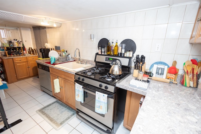 9005 Durham Ave, North Bergen, NJ 07047 - kitchen featuring appliances with stainless steel finishes, light countertops, tasteful backsplash, and tile walls