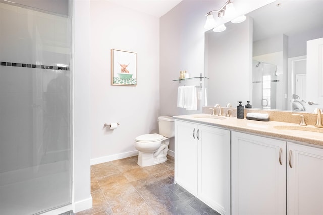 full bathroom featuring toilet, a shower stall, double vanity, and a sink