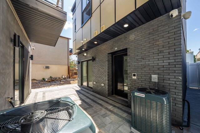 103 Poplar St Rear House, Rear House, Jersey City, NJ 07307 - view of patio / terrace with central air condition unit