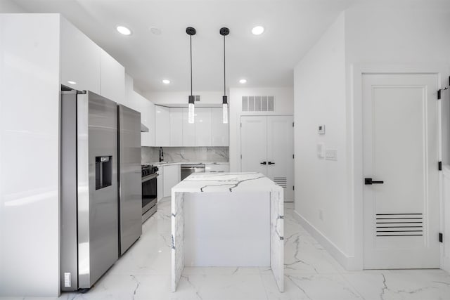 103 Poplar St Rear House, Rear House, Jersey City, NJ 07307 - kitchen featuring appliances with stainless steel finishes, white cabinetry, recessed lighting, modern cabinets, and light marble finish flooring