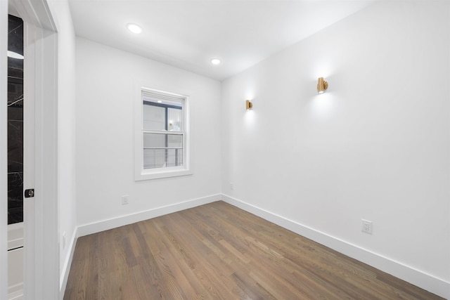 103 Poplar St Rear House, Rear House, Jersey City, NJ 07307 - spare room with dark wood-style flooring, baseboards, and recessed lighting