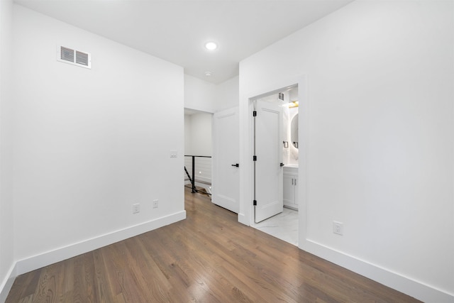 103 Poplar St Rear House, Rear House, Jersey City, NJ 07307 - unfurnished room featuring wood finished floors, baseboards, and recessed lighting