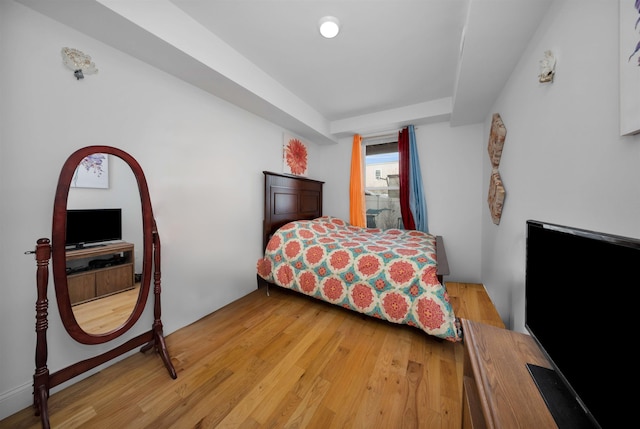 bedroom with light hardwood / wood-style flooring