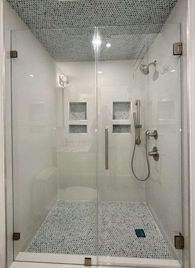 full bathroom with a stall shower
