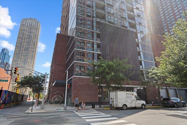 389 Washington St Unit 34E, Jersey City, NJ 07302 - view of building exterior featuring a city view