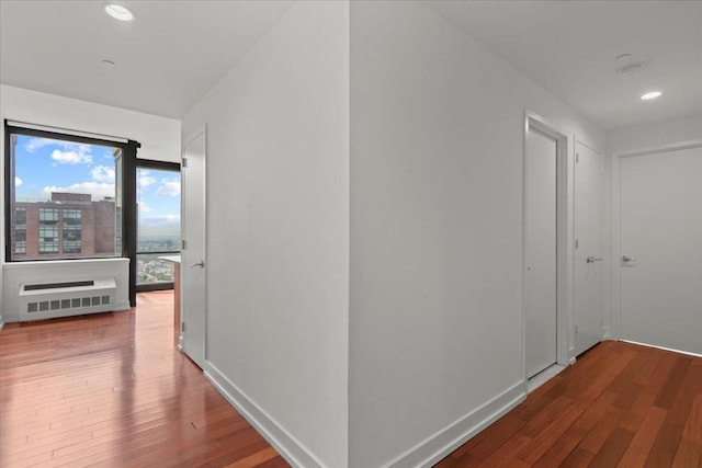 389 Washington St Unit 34E, Jersey City, NJ 07302 - corridor featuring hardwood / wood-style flooring and recessed lighting