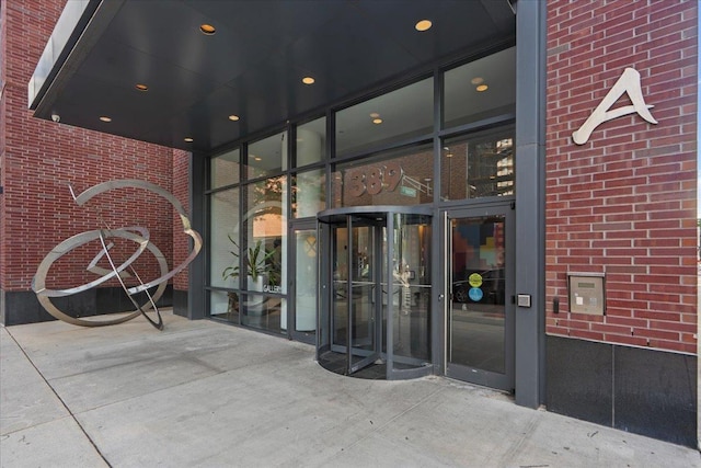 389 Washington St Unit 34E, Jersey City, NJ 07302 - property entrance with brick siding