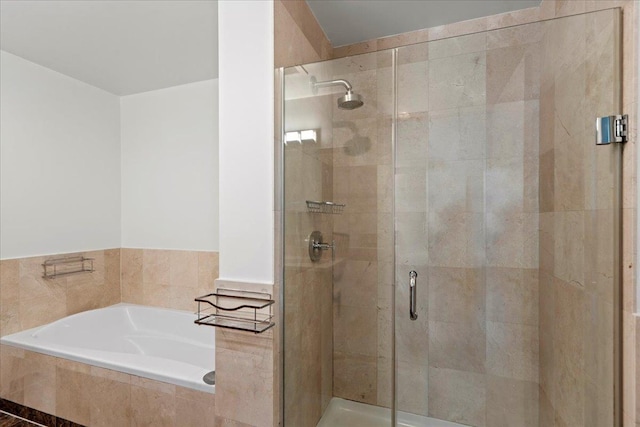 389 Washington St Unit 34E, Jersey City, NJ 07302 - full bathroom with a shower stall and a garden tub
