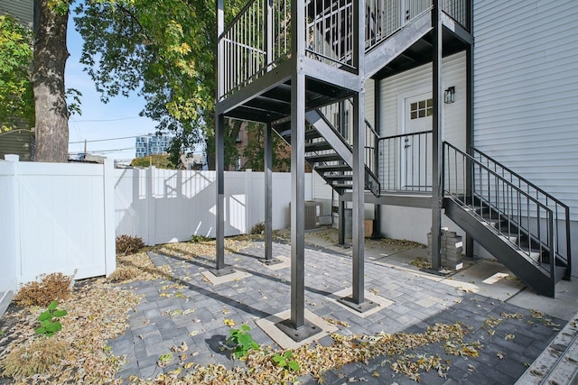 211 Summit Ave Unit 1, Jersey City, NJ 07304 - view of patio / terrace with fence, stairs, and central air condition unit