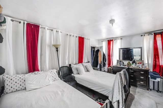 bedroom with marble finish floor