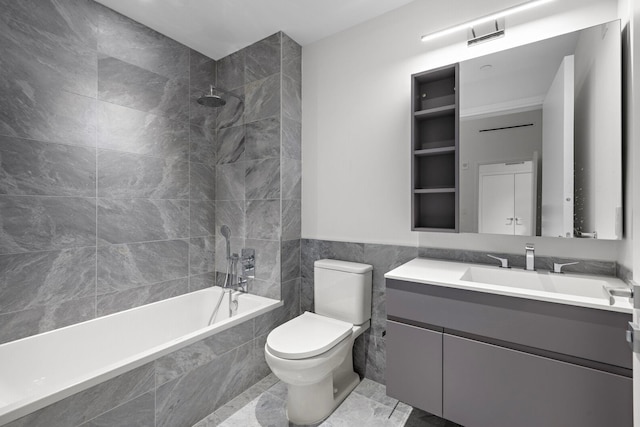 bathroom featuring tiled shower / bath, toilet, tile walls, and vanity