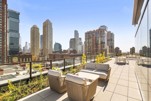 view of patio / terrace featuring a view of city