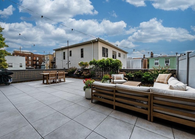 view of patio featuring a grill and outdoor lounge area