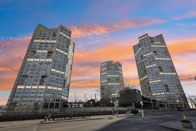 view of outdoor building at dusk