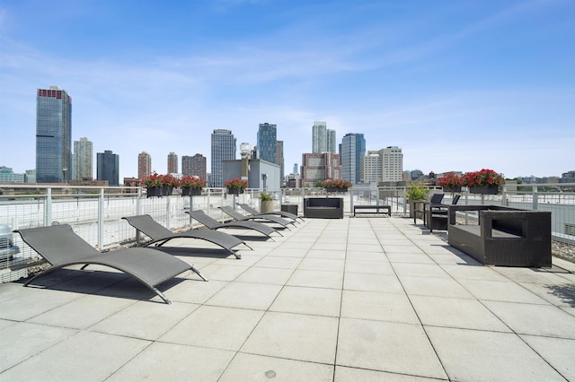 217 Newark Ave Unit 210, Jersey City, NJ 07302 - view of patio featuring a view of skyline