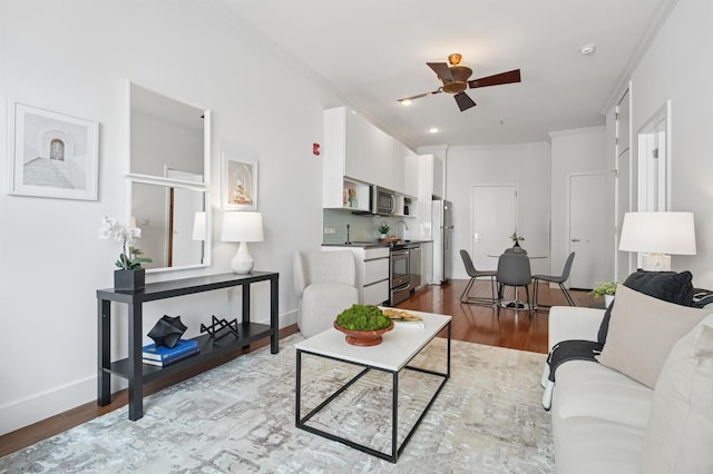 217 Newark Ave Unit 210, Jersey City, NJ 07302 - living area with ornamental molding, ceiling fan, and wood finished floors