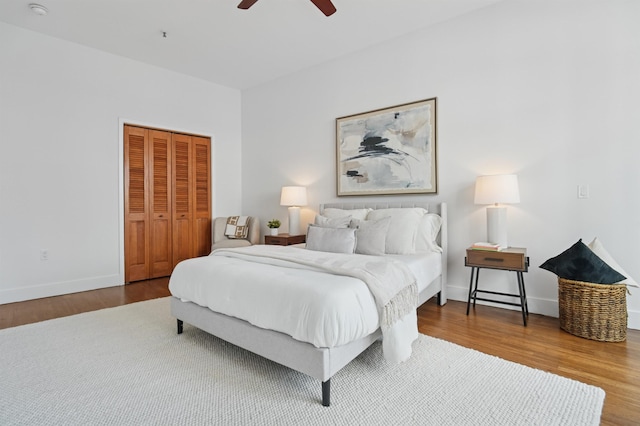217 Newark Ave Unit 210, Jersey City, NJ 07302 - bedroom featuring wood finished floors, a closet, and a ceiling fan