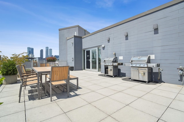 217 Newark Ave Unit 210, Jersey City, NJ 07302 - view of patio with a grill and outdoor dining space
