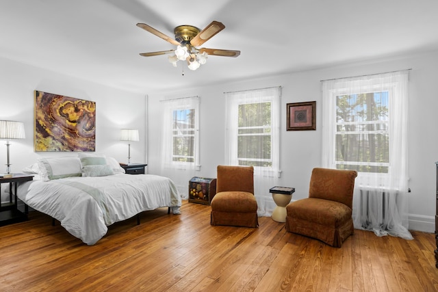 83 W 38th St, Bayonne, NJ 07002 - bedroom with wood-type flooring and ceiling fan