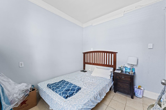 6113 Washington St, West New York, NJ 07093 - tiled bedroom featuring ornamental molding and baseboards