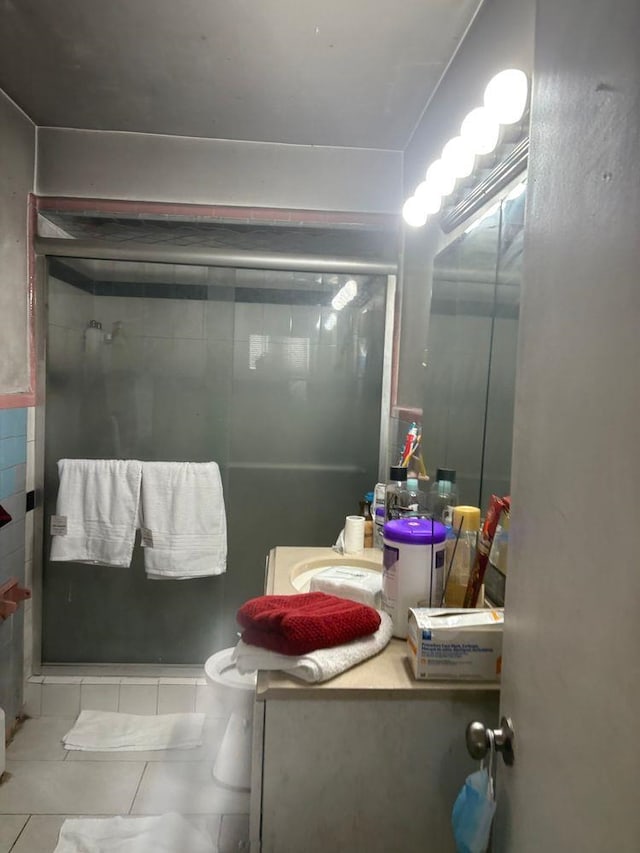 6113 Washington St, West New York, NJ 07093 - bathroom with a stall shower and tile patterned flooring