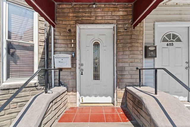 6113 Washington St, West New York, NJ 07093 - doorway to property with brick siding and stone siding