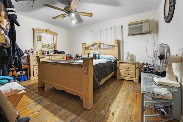 419 16th St, Union City, NJ 07038 - bedroom with a wall mounted air conditioner, hardwood / wood-style floors, and a ceiling fan