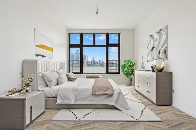 1500 Hudson St Unit 7H, Hoboken, NJ 07030 - bedroom featuring baseboards and a skyline view