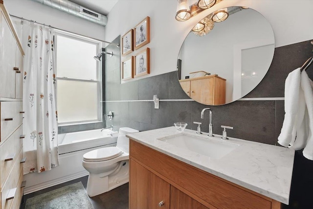 207 7th St, Hoboken, NJ 07030 - bathroom with shower / bath combo with shower curtain, toilet, and vanity