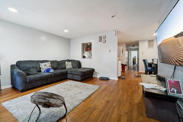 12 Bayview Ave, Jersey City, NJ 07305 - living room with hardwood / wood-style flooring, baseboards, visible vents, and recessed lighting