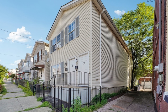 12 Bayview Ave, Jersey City, NJ 07305 - view of side of home with fence and crawl space