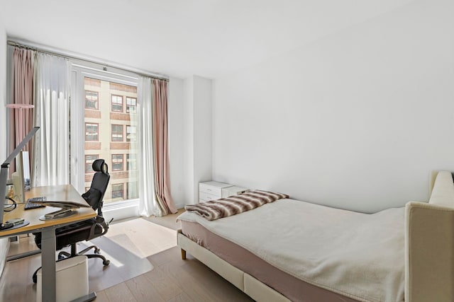 bedroom featuring light hardwood / wood-style flooring