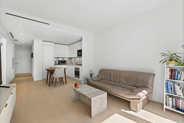 living room featuring light hardwood / wood-style flooring