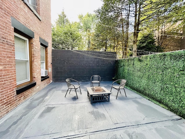 258 Montgomery St Unit 0, Jersey City, NJ 07302 - view of patio / terrace with a fire pit, a fenced backyard, and cooling unit