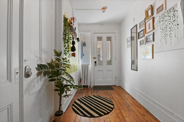258 Montgomery St Unit 0, Jersey City, NJ 07302 - entryway with radiator heating unit, hardwood / wood-style flooring, and baseboards