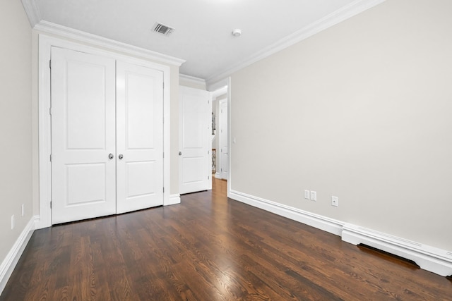2175 Edwin Ave, Fort Lee, NJ 07024 - unfurnished bedroom with baseboards, ornamental molding, dark wood-style floors, and a closet