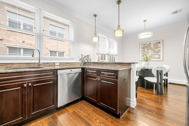 2175 Edwin Ave, Fort Lee, NJ 07024 - kitchen with dishwasher, dark wood-type flooring, ornamental molding, dark brown cabinetry, and a sink