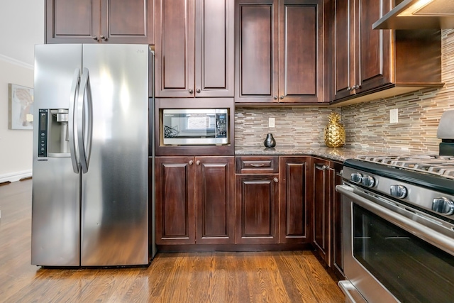 2175 Edwin Ave, Fort Lee, NJ 07024 - kitchen featuring stainless steel appliances, decorative backsplash, stone counters, dark wood-style floors, and crown molding