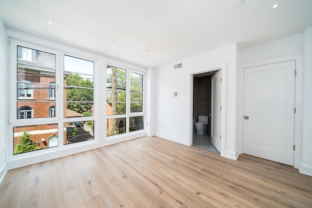 209 6th St Unit 1, Hoboken, NJ 07030 - spare room with light wood-style floors, baseboards, and recessed lighting