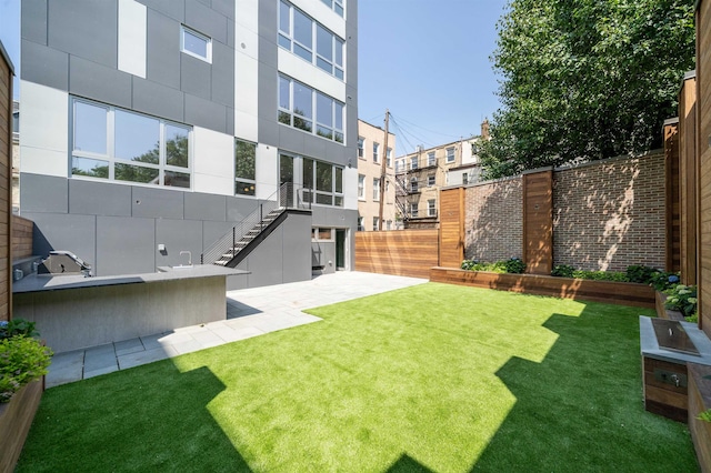 209 6th St Unit 1, Hoboken, NJ 07030 - view of yard featuring stairs