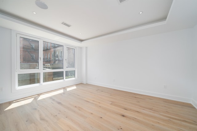 209 6th St Unit 1, Hoboken, NJ 07030 - empty room with a raised ceiling, light wood-style flooring, baseboards, and recessed lighting