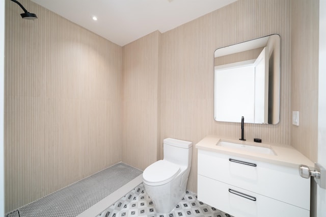 209 6th St Unit 1, Hoboken, NJ 07030 - bathroom featuring vanity, toilet, tile patterned floors, and a shower