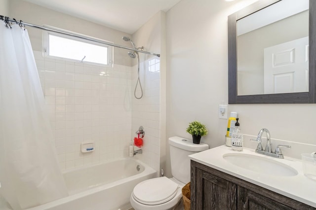 full bathroom with toilet, vanity, and shower / bath combo with shower curtain