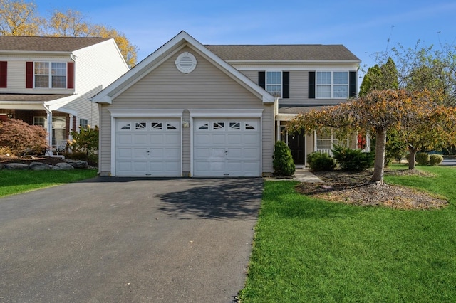 view of front property featuring a front lawn