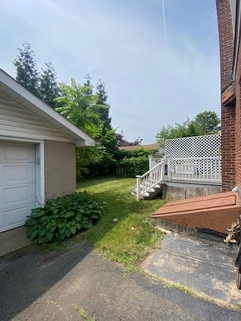6 Stone Ave, Elmwood Park, NJ 07407 - view of green lawn featuring a garage